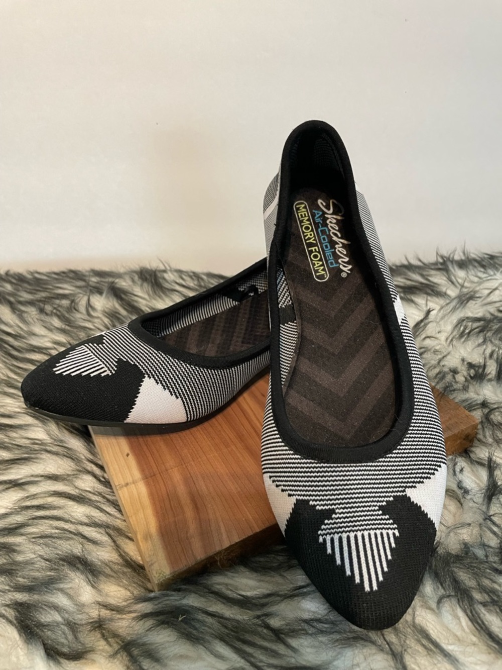Skechers Black and White Pointed Toe Knit Flats